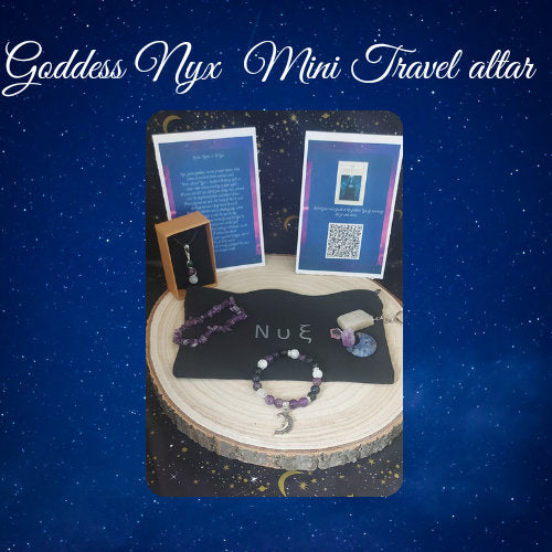 Goddess Nyx Mini Travel altar set on a wooden base with a starry night background