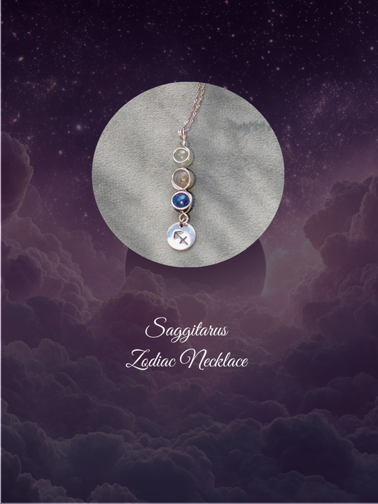 Sagittarius Zodiac necklace on a cloud and starry night sky background